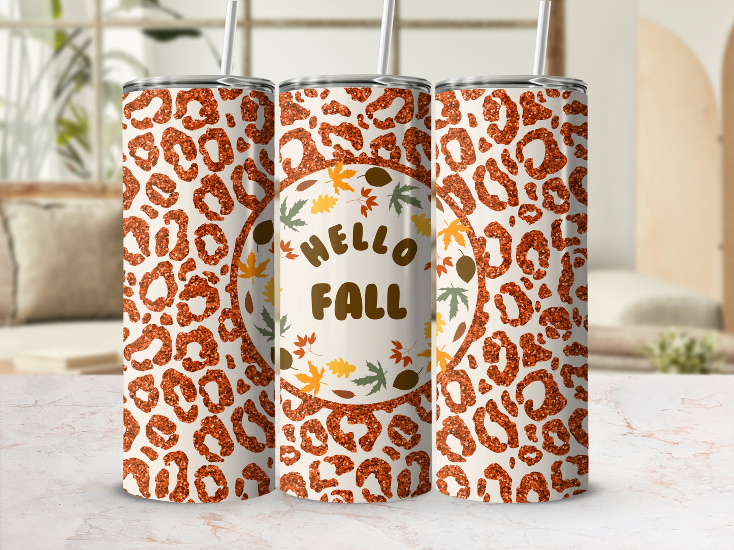 Leopard print tumbler with "Hello Fall" text and autumn leaves.