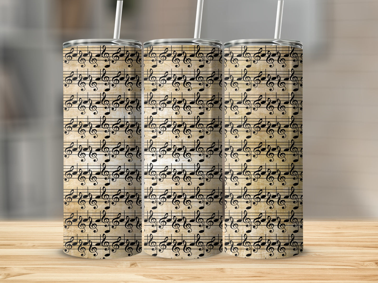 Three tumblers with a vintage sheet music pattern featuring treble clefs and musical notes.