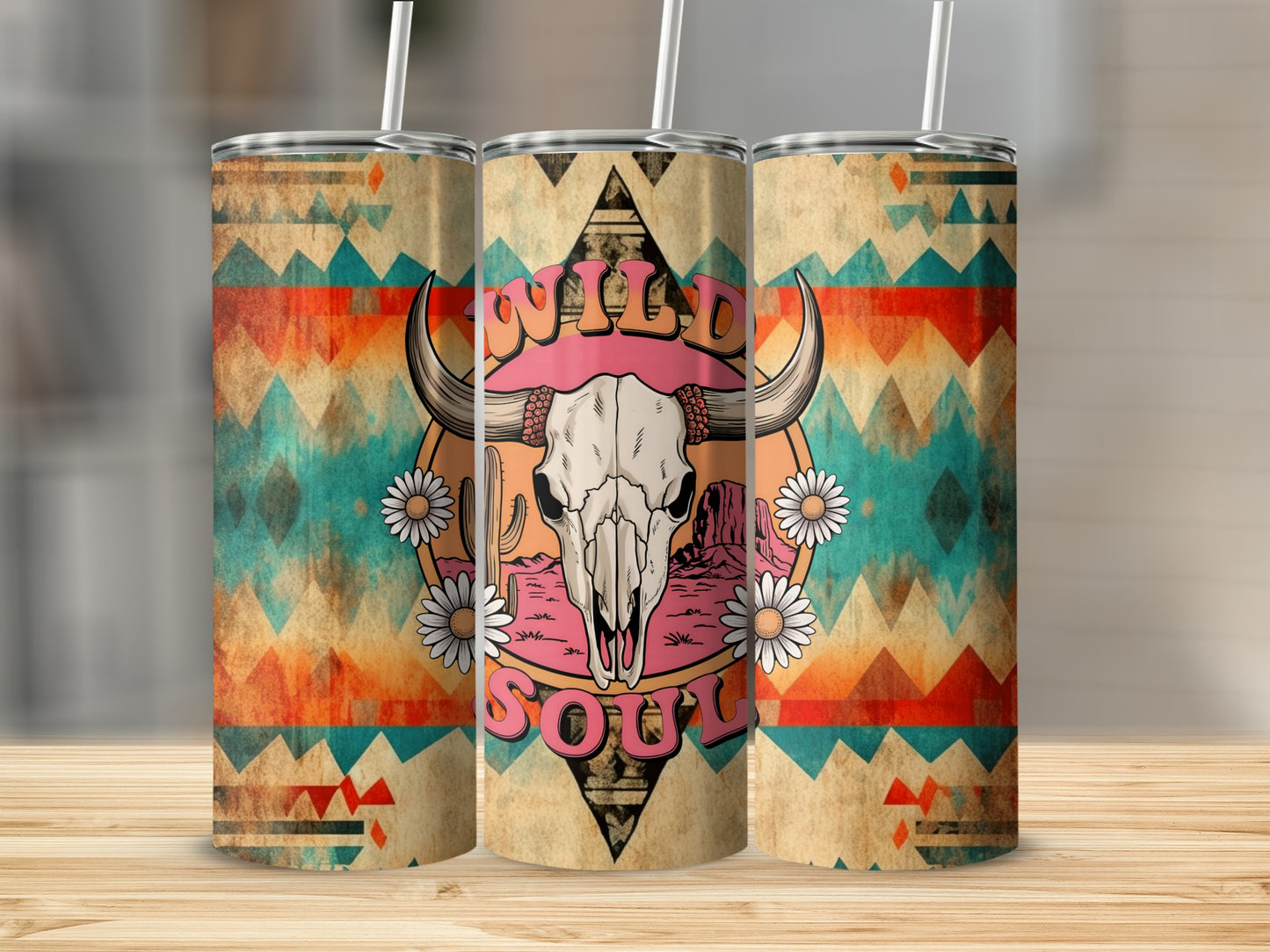 Western-themed tumbler with bull skull, desert, and flowers, reading "Wild Soul".