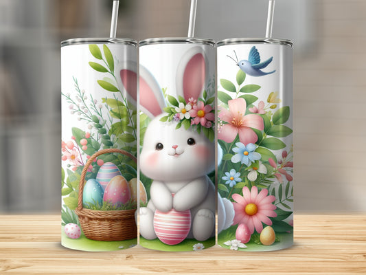 Easter bunny with basket of eggs surrounded by flowers and greenery.