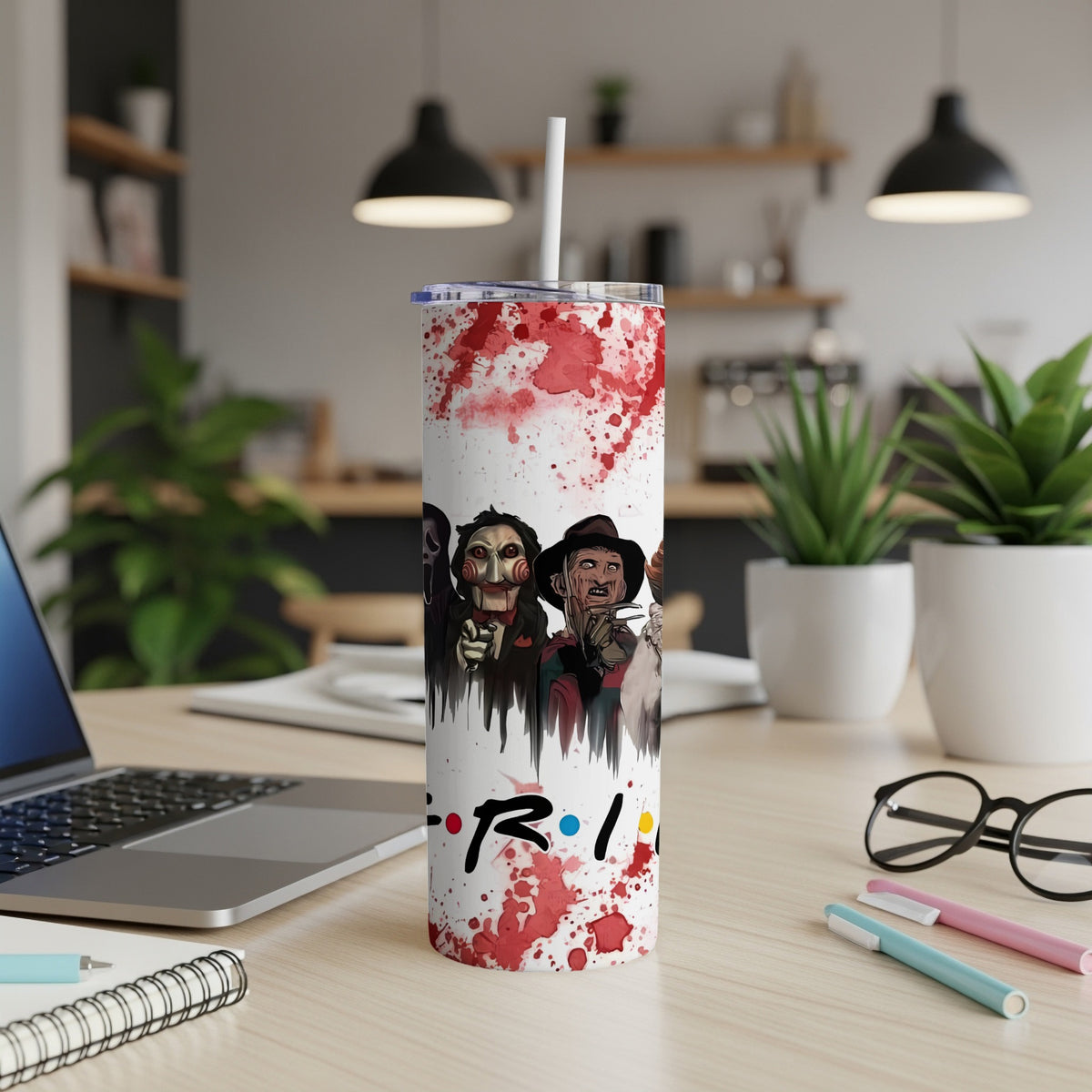Tumbler with horror movie characters and "Friends" logo, splattered with red.