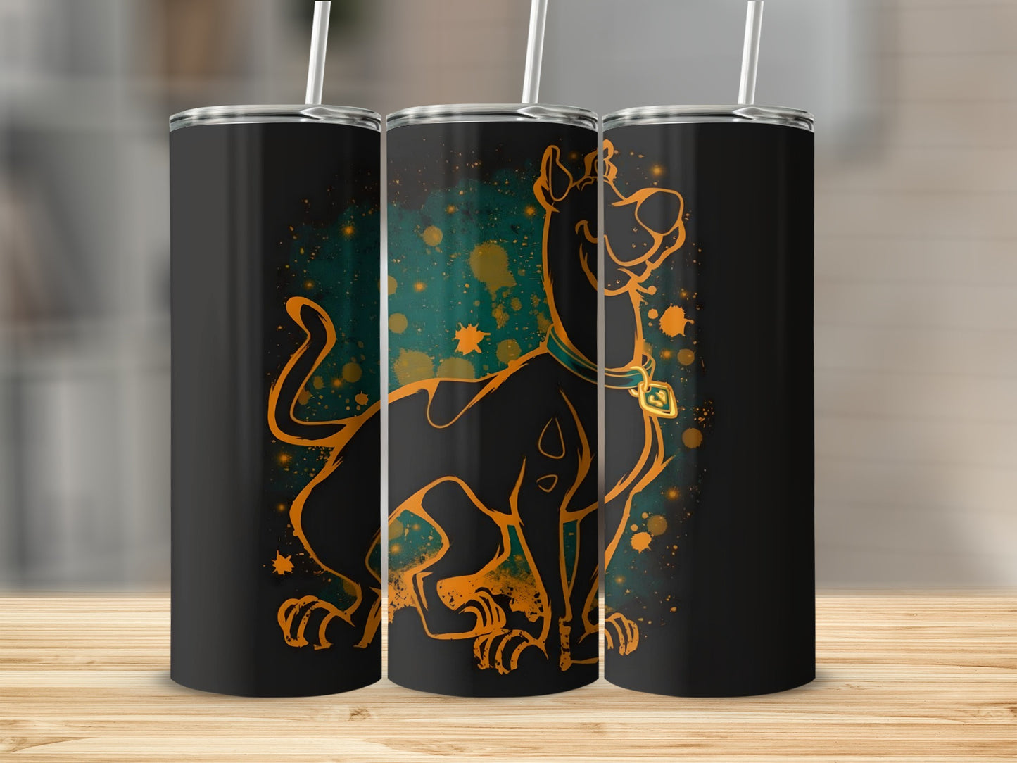 Scooby-Doo character outlined in orange on a black tumbler with colorful splatters.