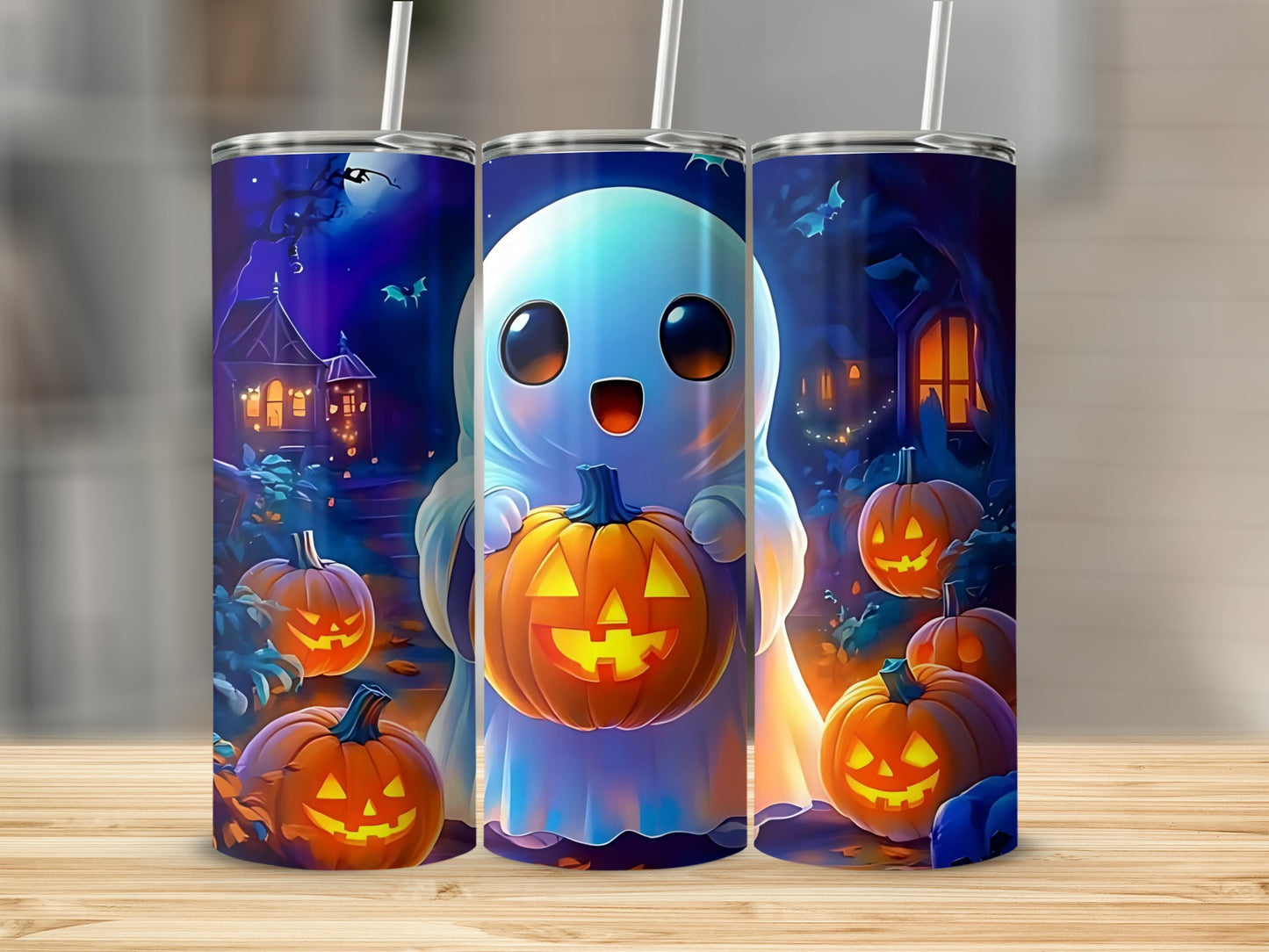 Three tumblers with a cute ghost holding a jack-o'-lantern on a spooky night.