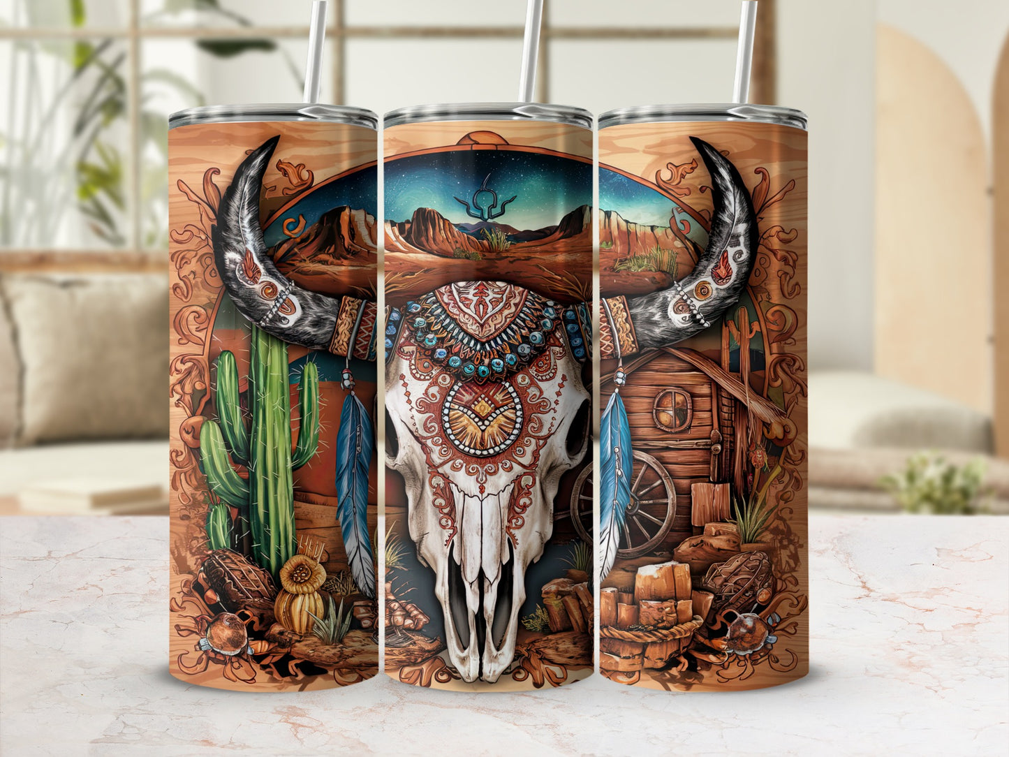Bull skull with western desert landscape and tribal headdress on three tumblers.