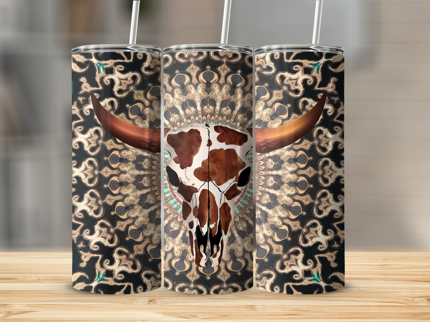Bull skull with mandala pattern on three tumblers.