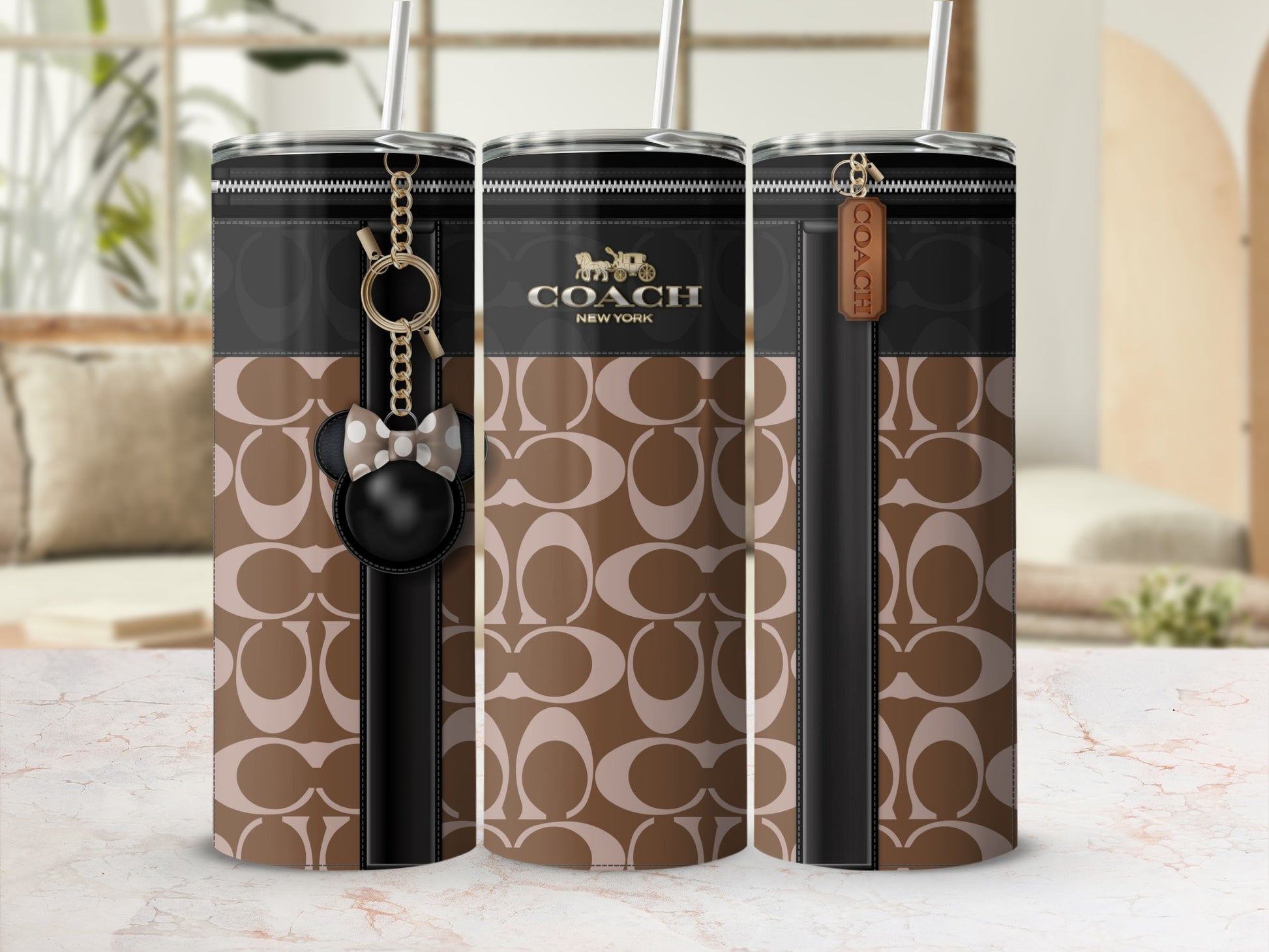 Coach tumbler with signature pattern, keychain and leather tag.