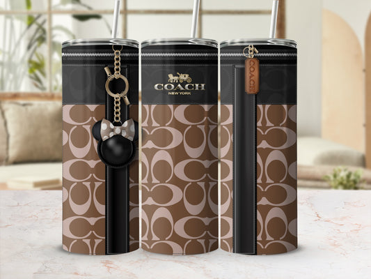 Coach tumbler with signature pattern, keychain and leather tag.