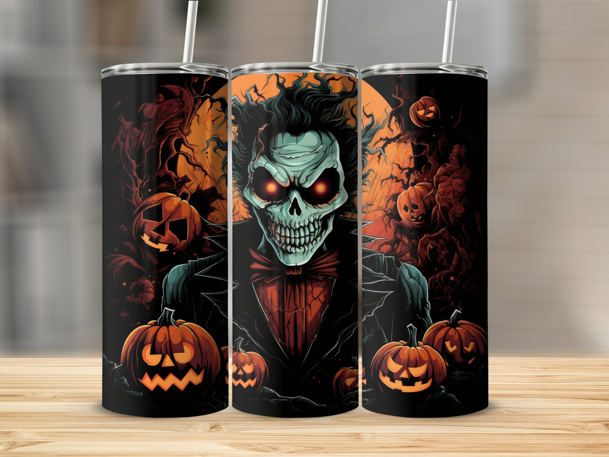 Three tumblers with a spooky Halloween design featuring a skeleton in a suit and pumpkins.