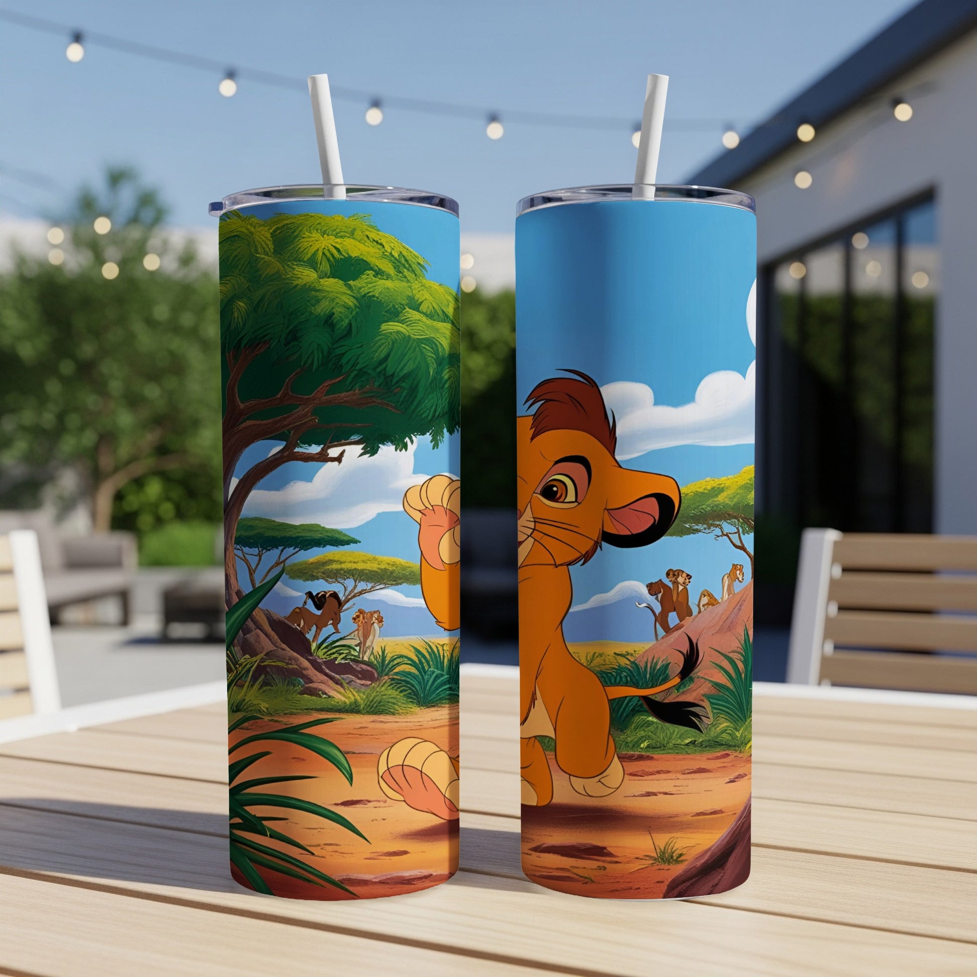 Lion King tumbler with Simba, Timon, and Pumbaa in a savanna scene.