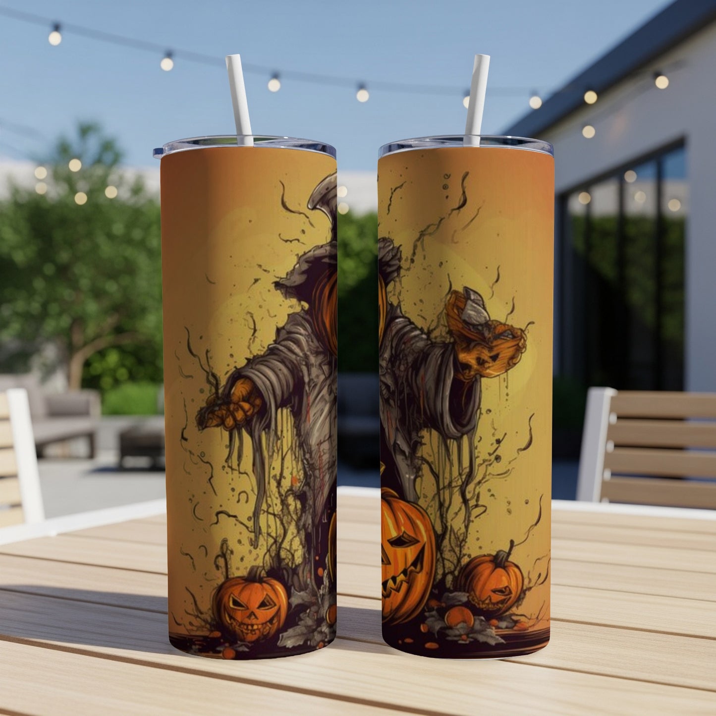 Two tumblers with a spooky Halloween design featuring a grim reaper and jack-o'-lanterns.