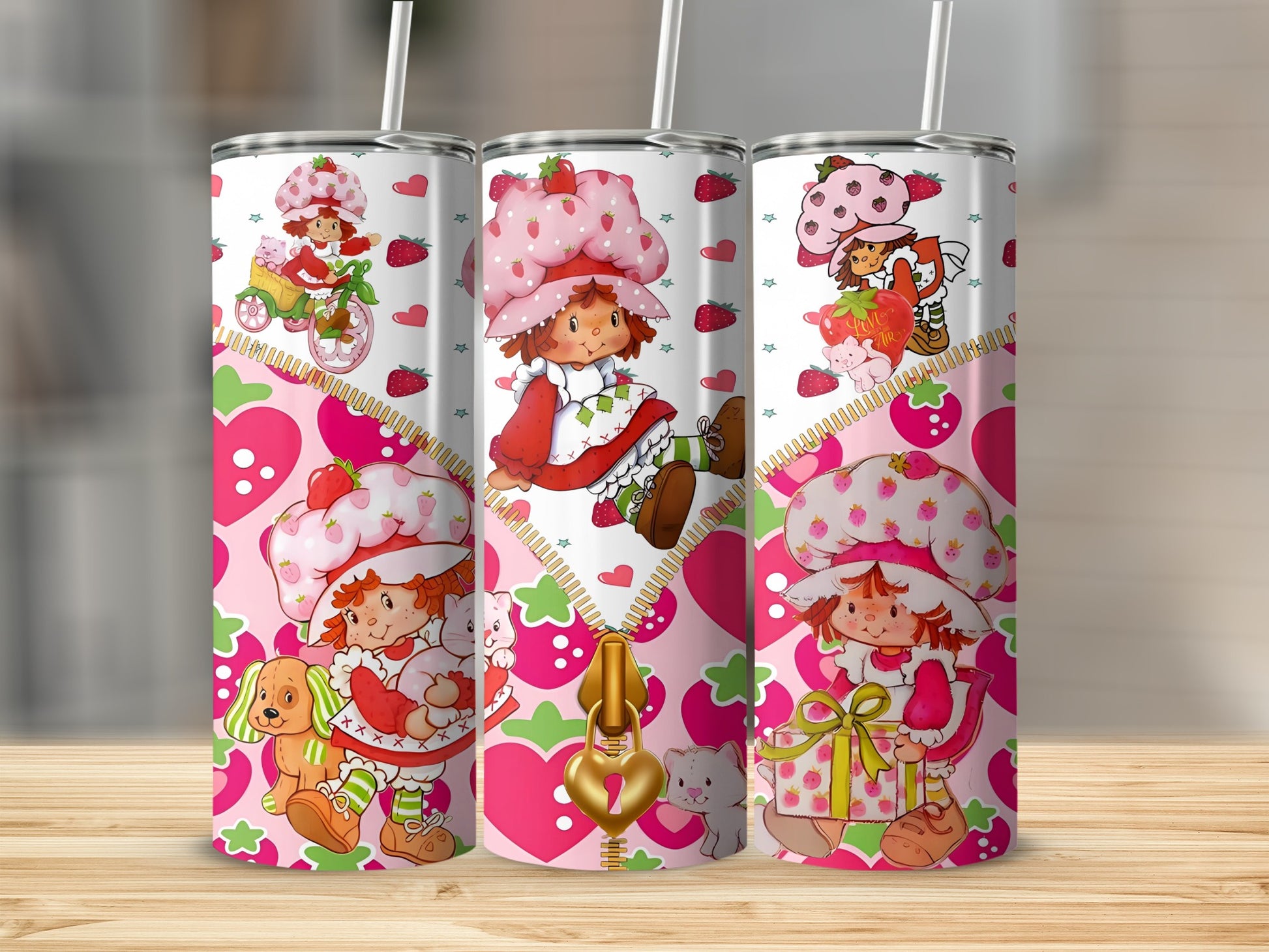 Strawberry Shortcake and friends on pink patterned tumbler with zipper and heart details.