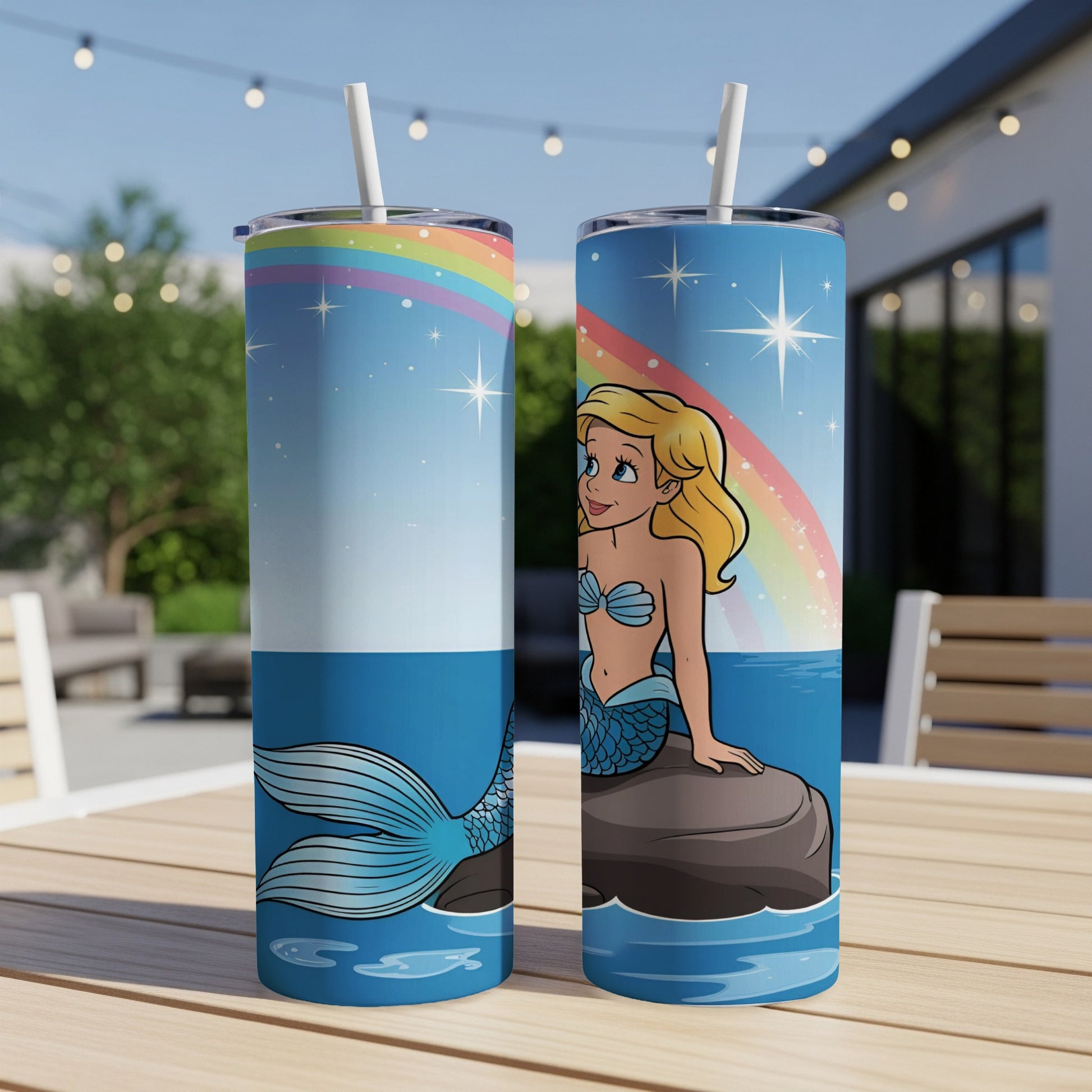 Two mermaid tumblers with a whimsical scene.