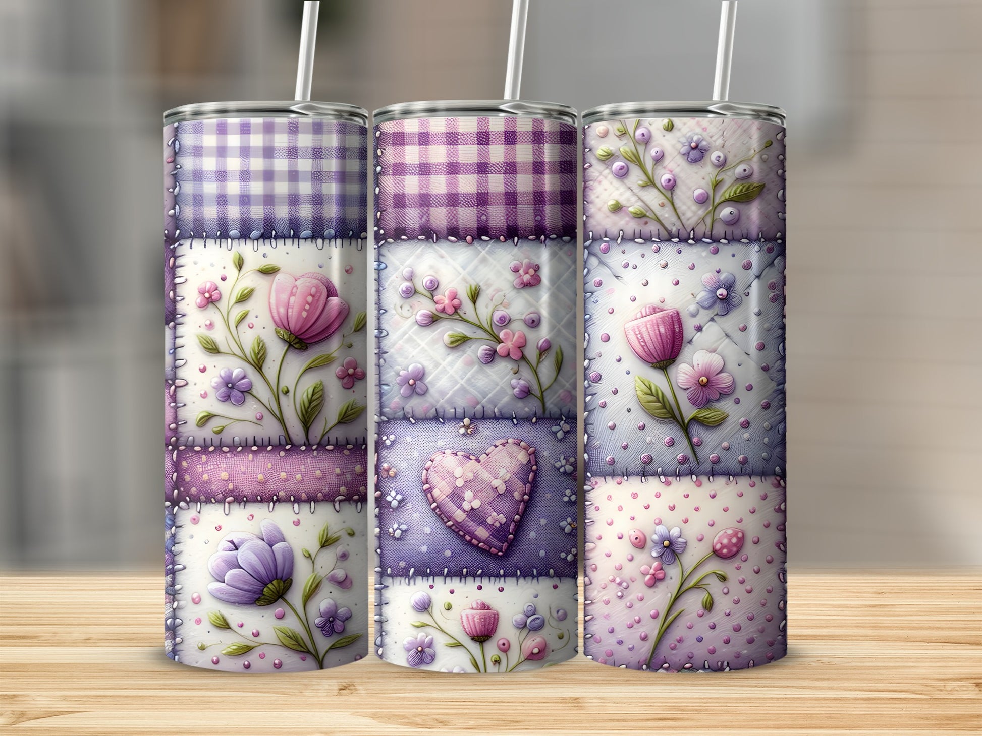 Patchwork quilt design with flowers and hearts on three tumblers.