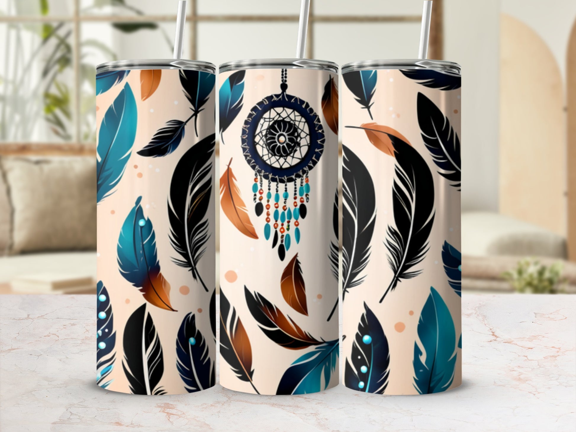 Three tumblers with a light tan background and a feather and dreamcatcher pattern.