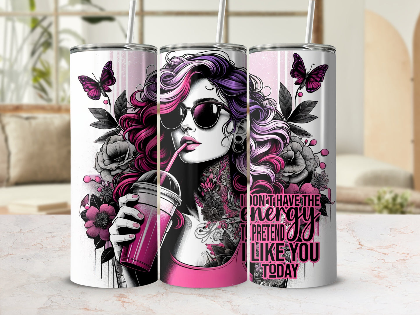 Tumbler with woman, flowers, butterflies, and text about energy.