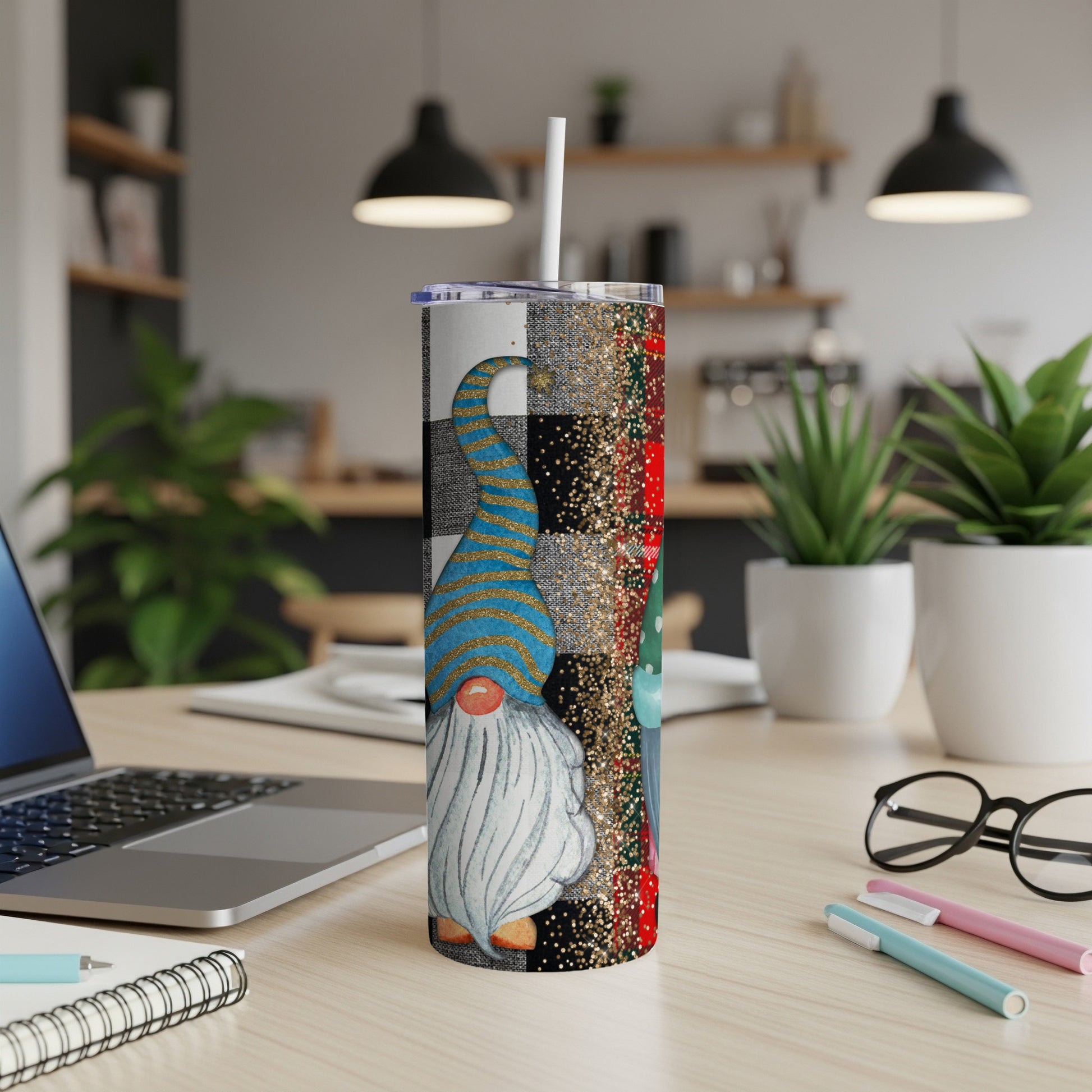 Christmas gnome tumbler with blue and gold hat and buffalo plaid pattern.