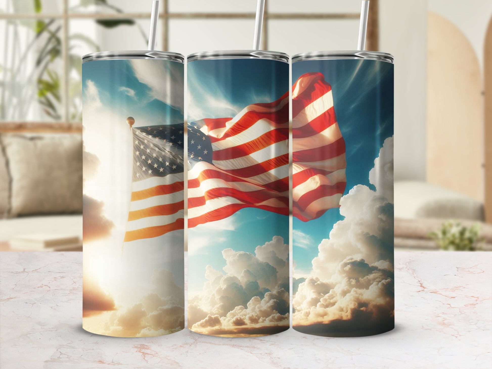 Three tumblers featuring American flags waving against a cloudy sky.