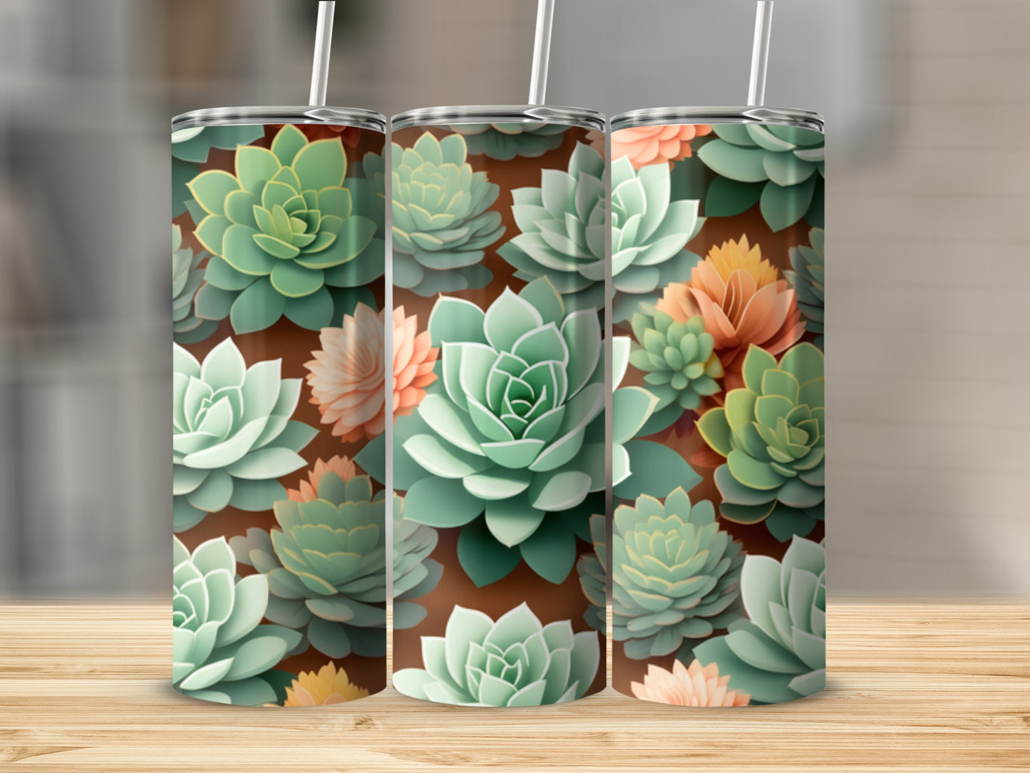 Three tumblers with a repeating pattern of green and coral succulents.