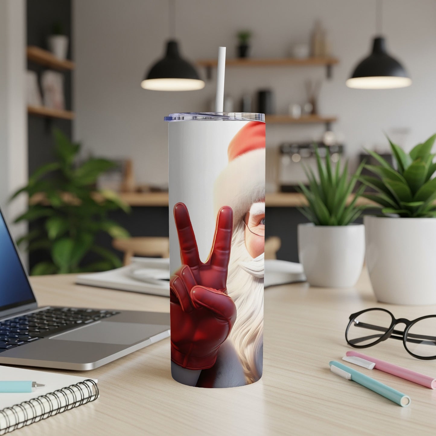 Santa Claus giving a peace sign on a festive tumbler.