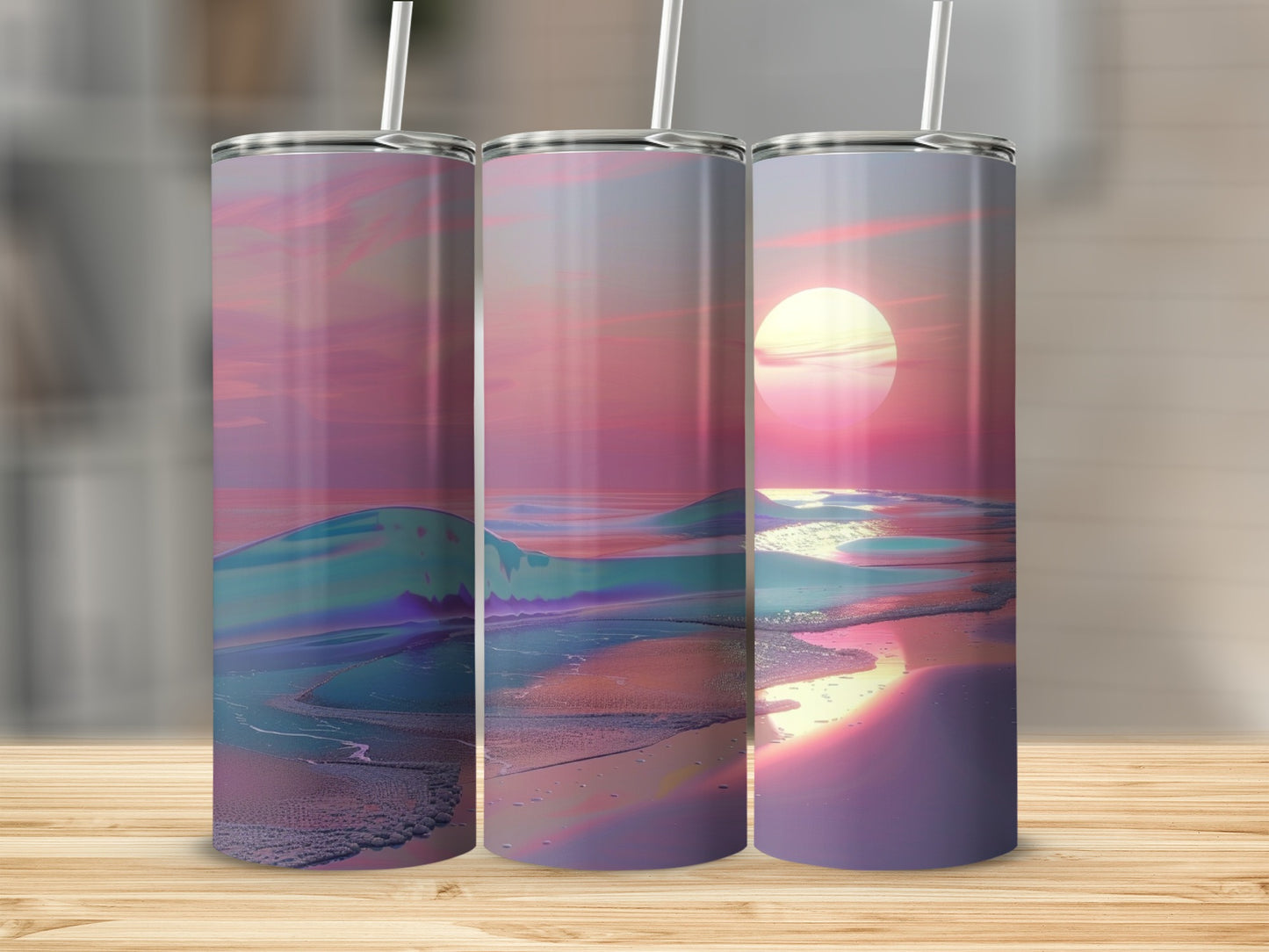 Three tumblers showing a sunset over the ocean with a pink and purple sky.