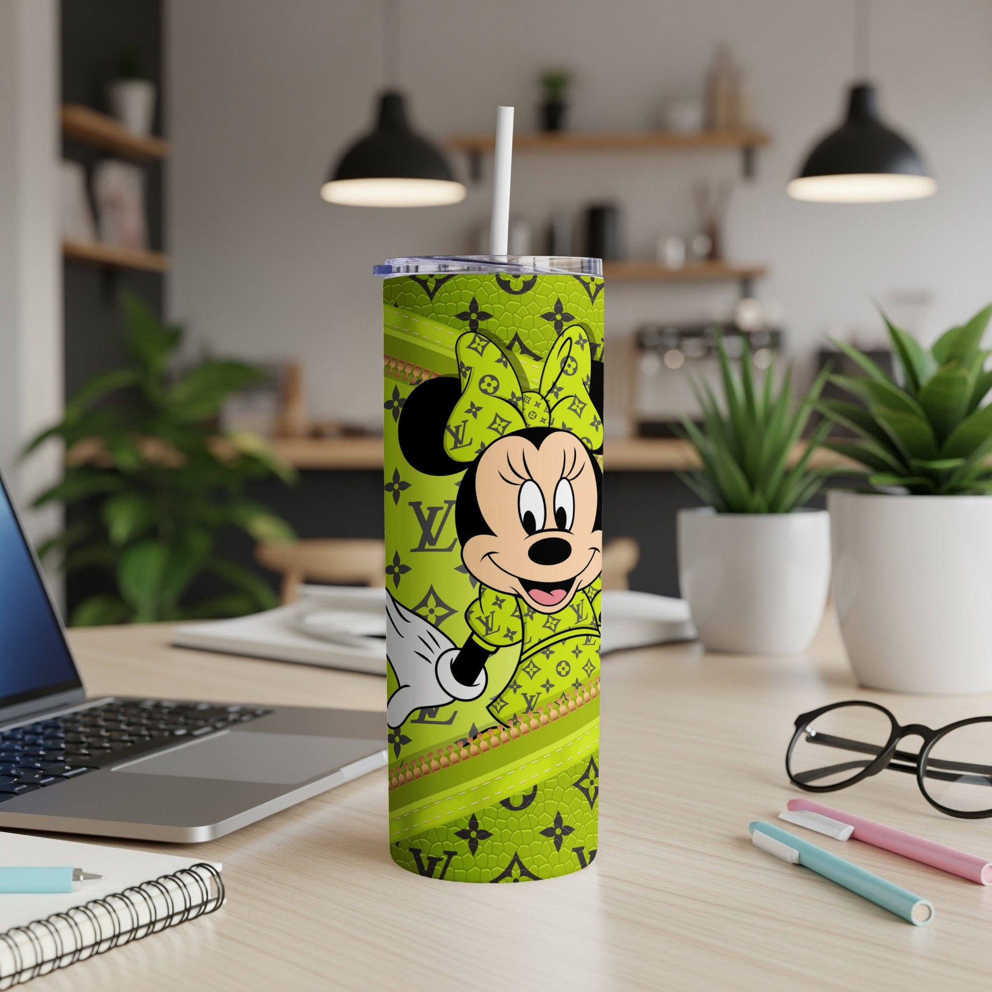 Minnie Mouse tumbler with green Louis Vuitton-inspired pattern.