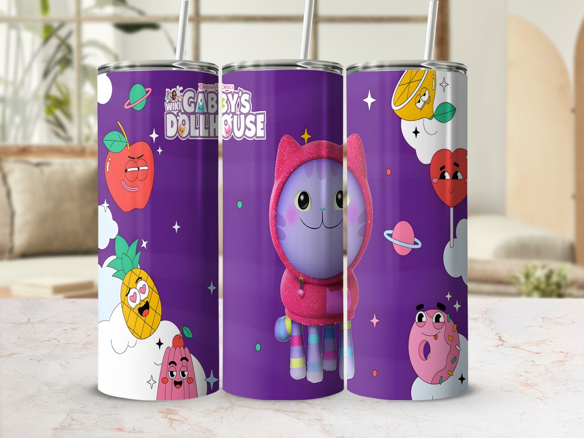 Gabby's Dollhouse character on purple tumbler with fruit and planet designs.