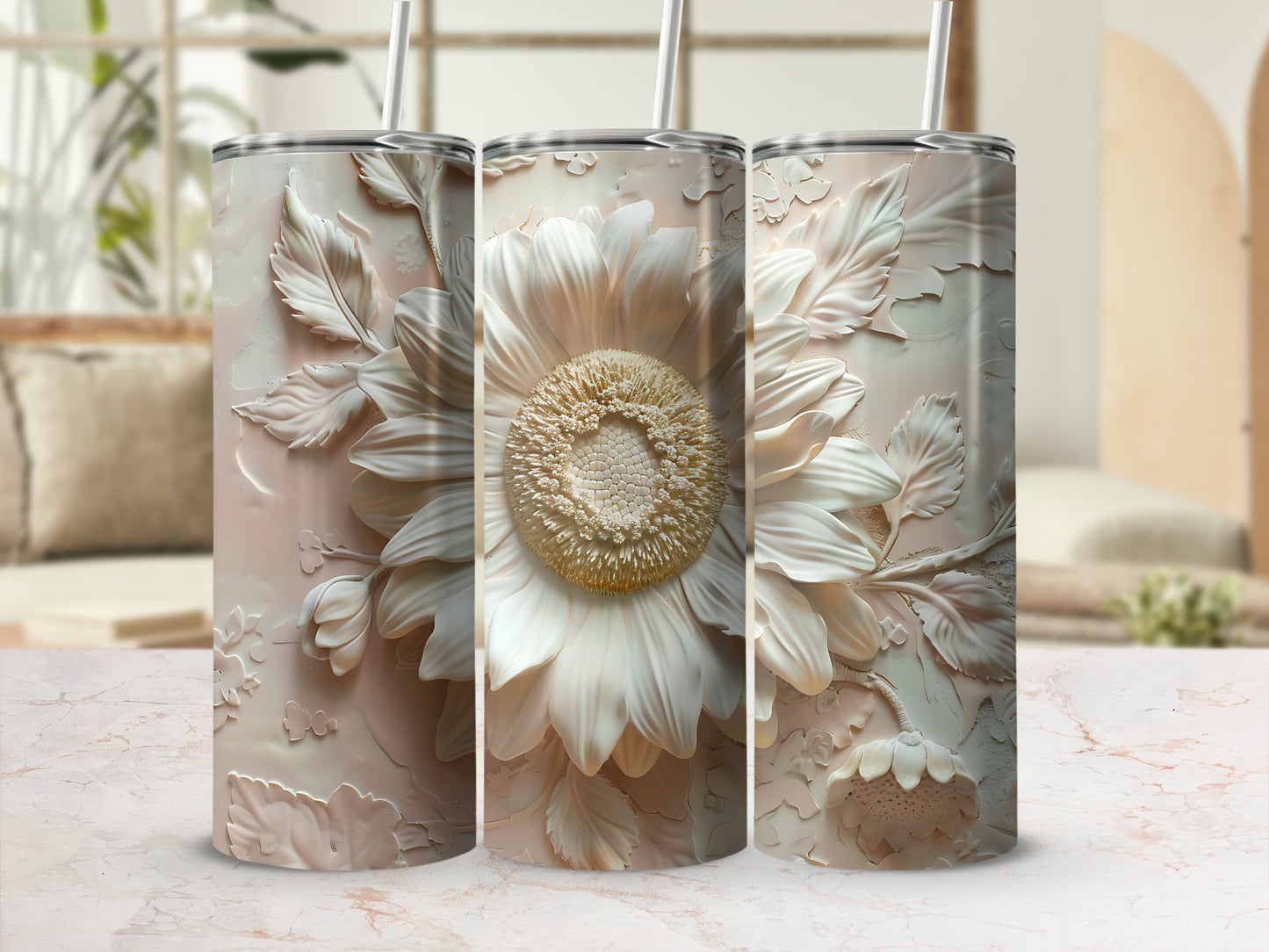 Three tall tumblers with embossed white sunflower designs.