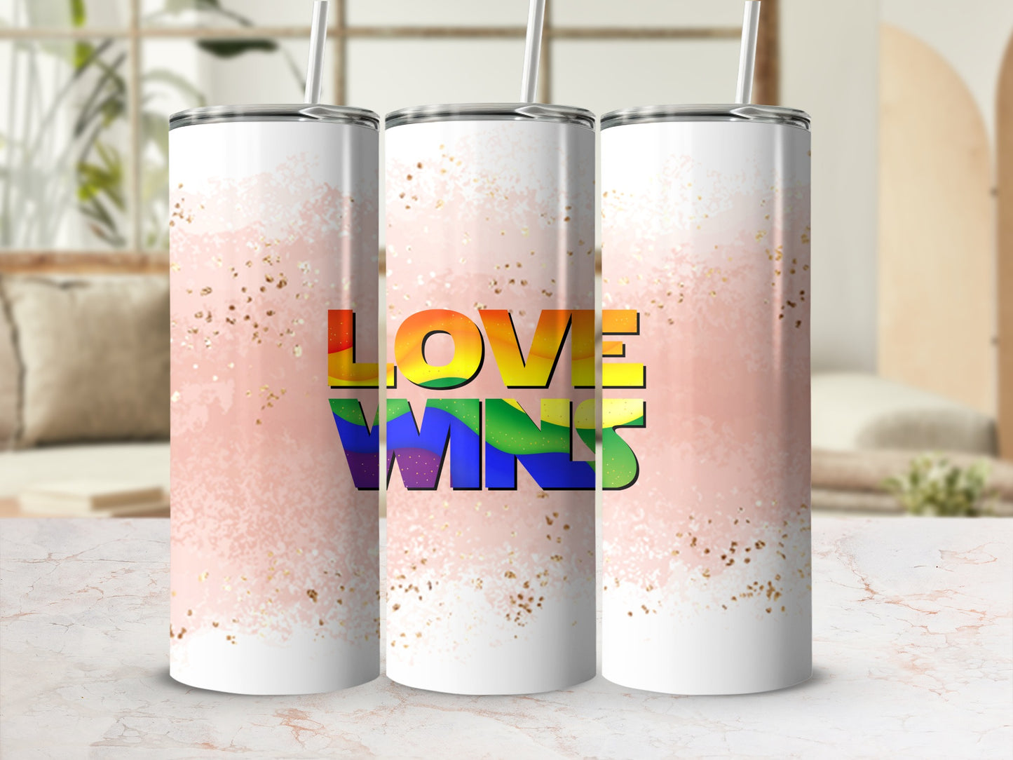Pride rainbow "Love Wins" text on three white sublimation tumblers.