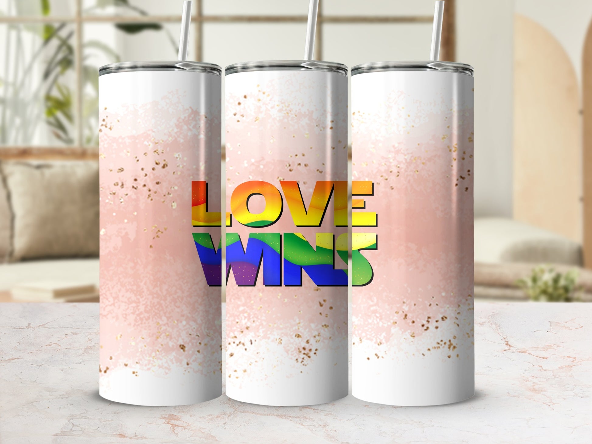 Pride rainbow "Love Wins" text on three white sublimation tumblers.