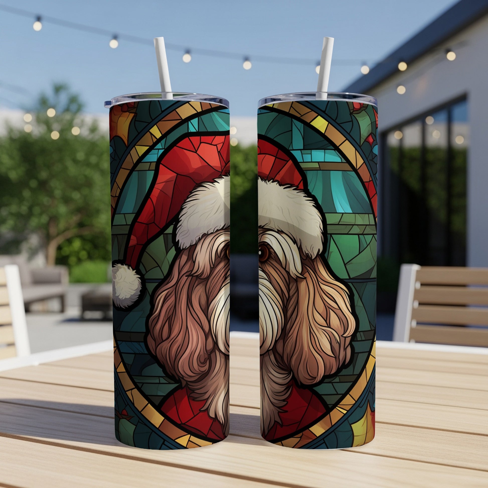 Two tall tumblers with a festive dog wearing a Santa hat in stained glass design.