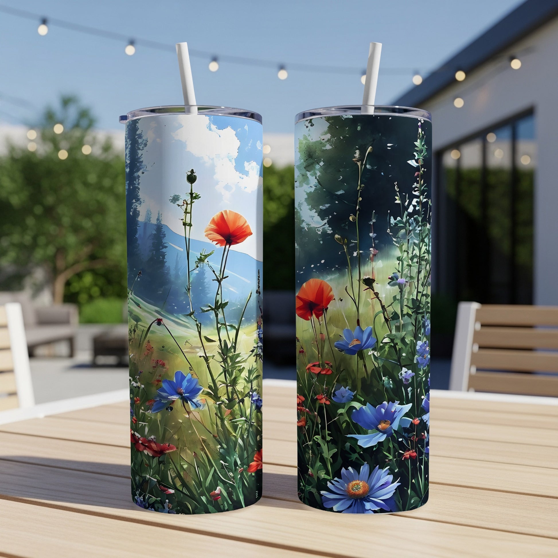 Two tumblers with a wildflower landscape design.