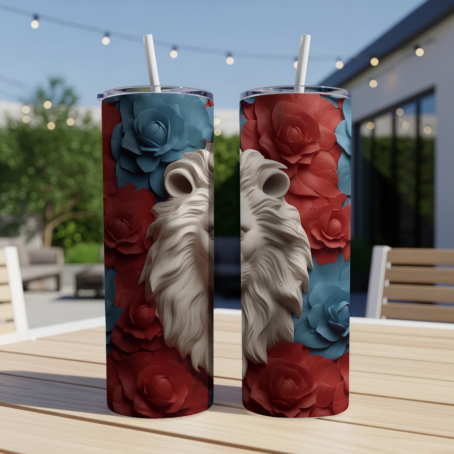 Two tumblers with a lion's head design and red and blue floral patterns.