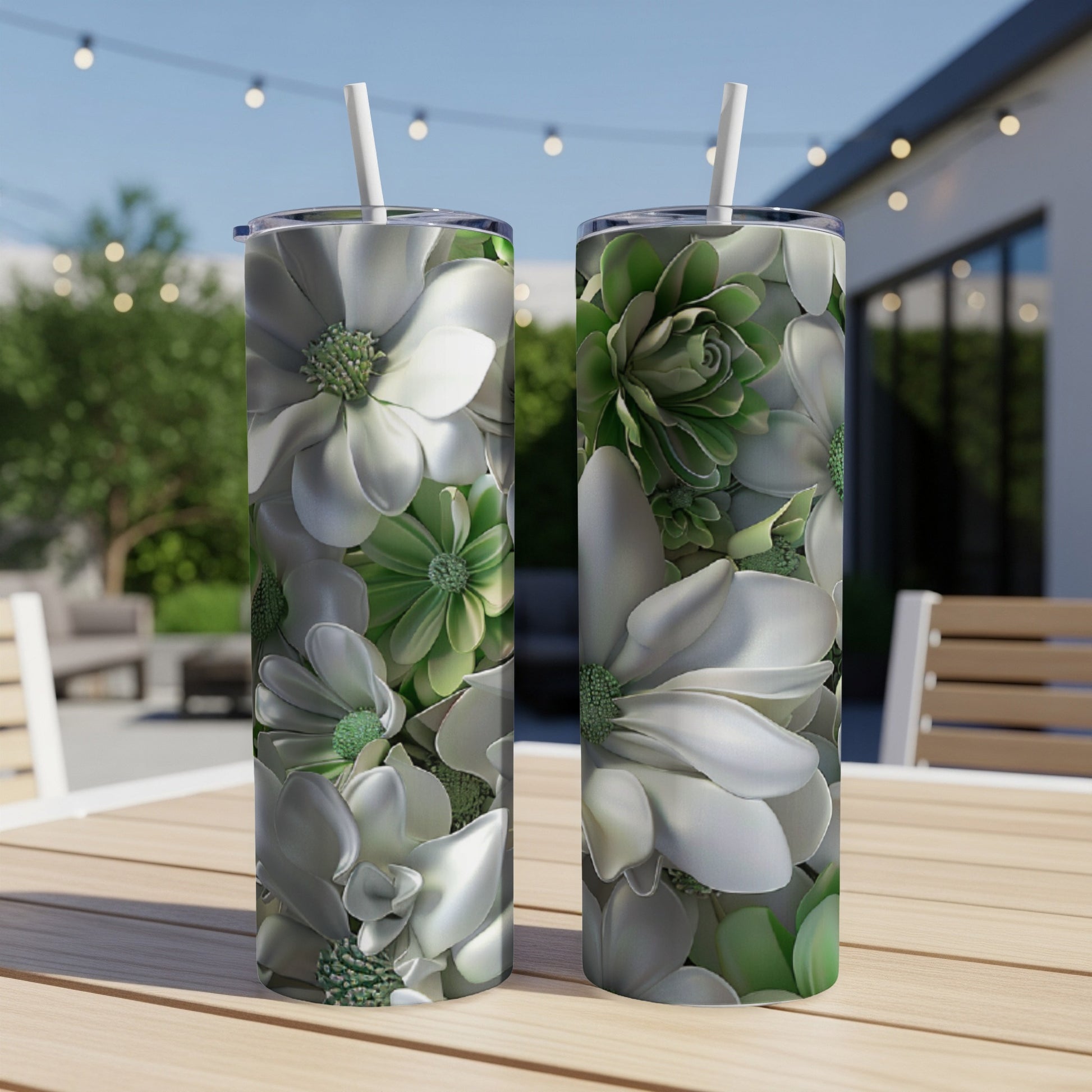 Two tumblers with white magnolia and green succulent floral pattern.
