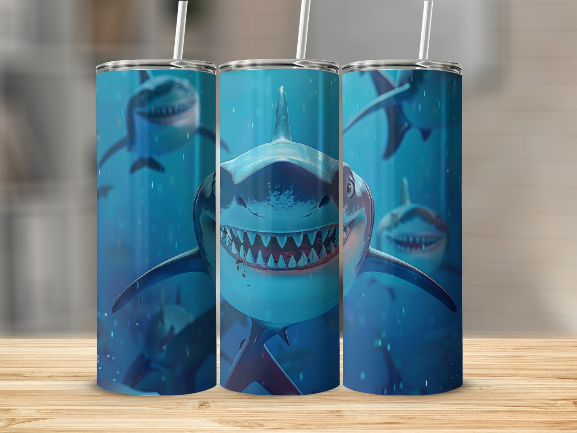 Three tumblers featuring a grinning shark with sharp teeth on a blue background.