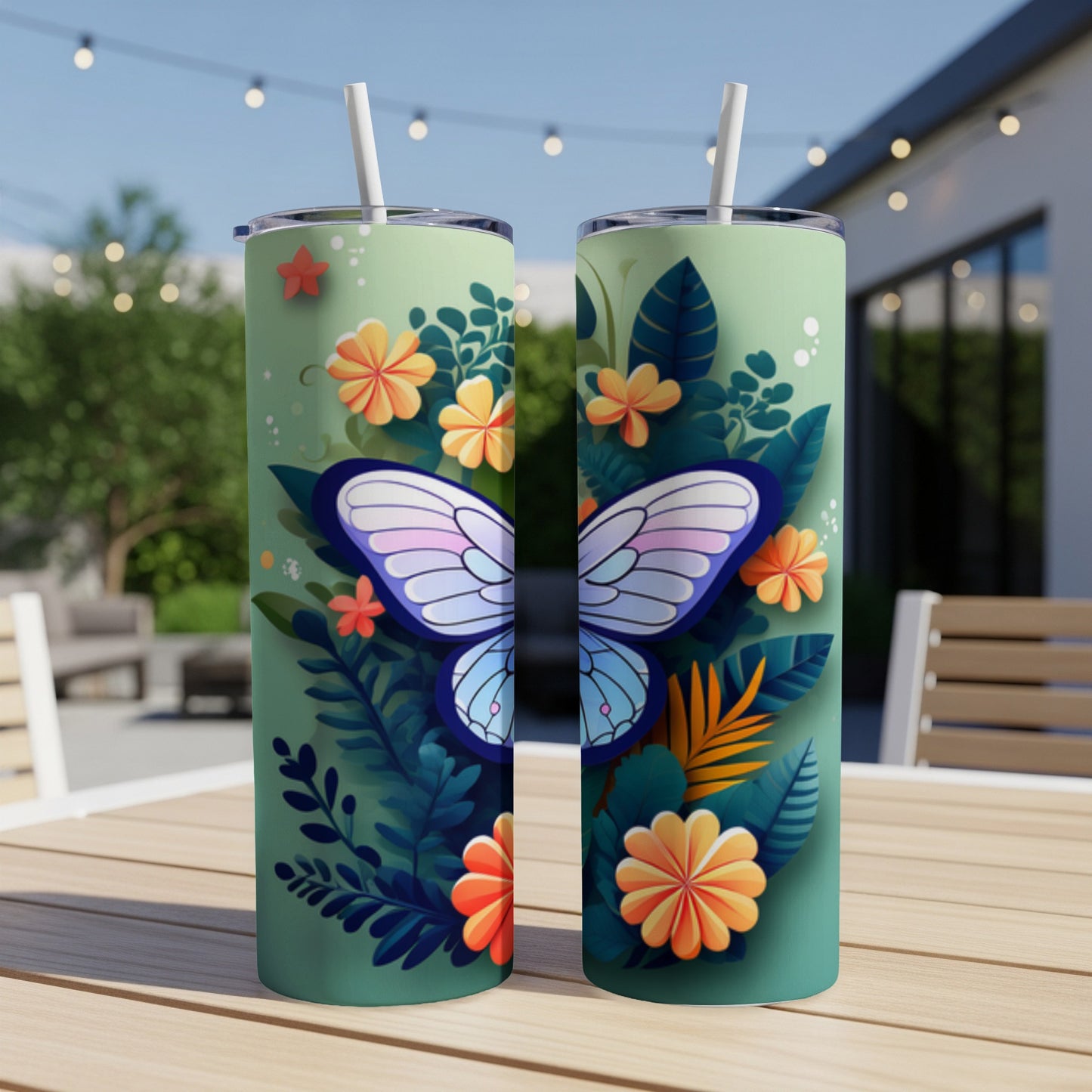 Two tumblers with a blue butterfly and floral pattern.