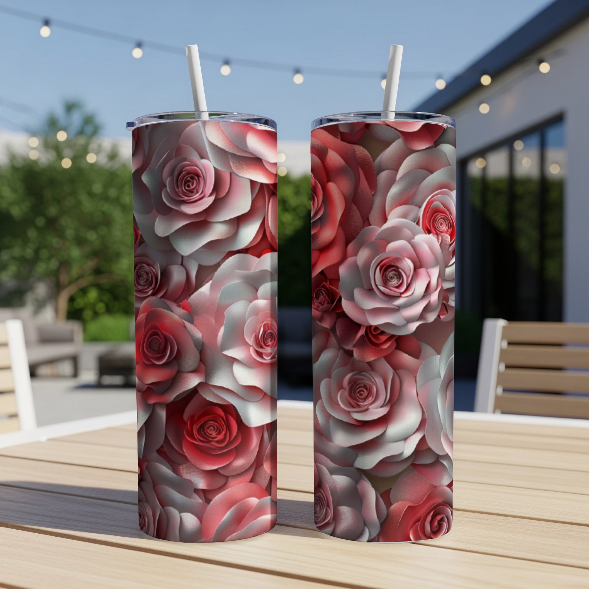 Two tumblers with a dense, overlapping pattern of pink and red roses.
