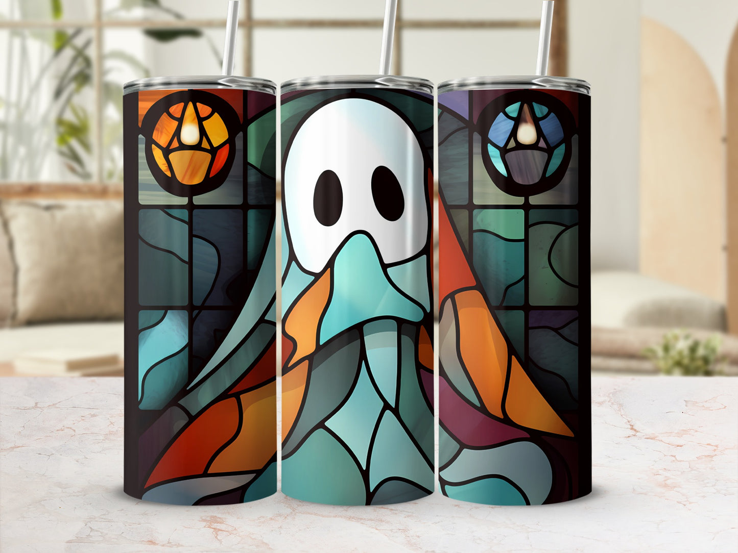 Three stained-glass inspired tumblers featuring a white ghost design.