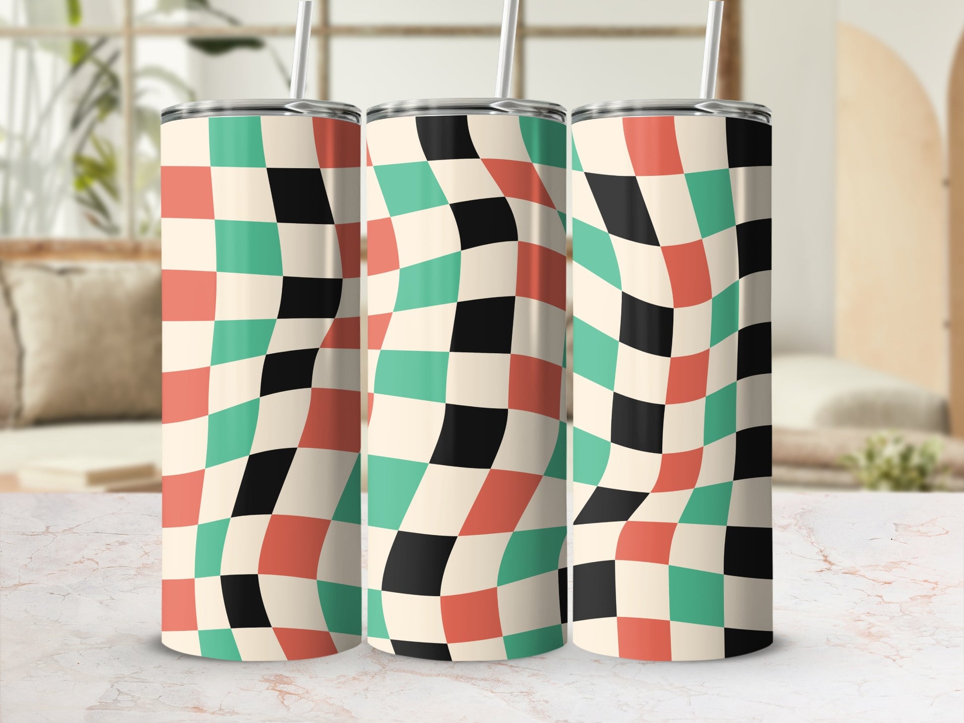 Three tumblers with a retro checkered pattern in cream, teal, and black.