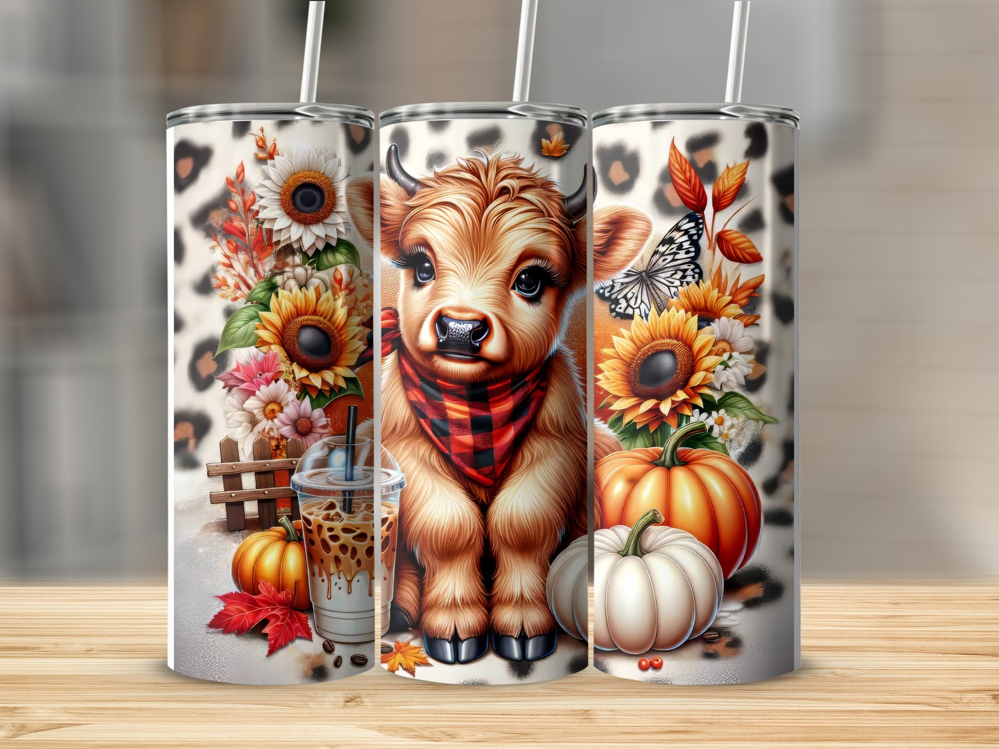Cute cow with sunflowers, pumpkins, and leopard print on a tumbler.