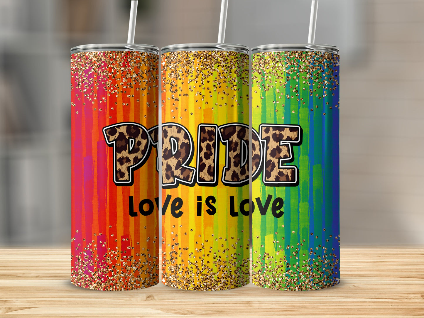 Three Pride-themed tumblers with glitter and leopard print text.
