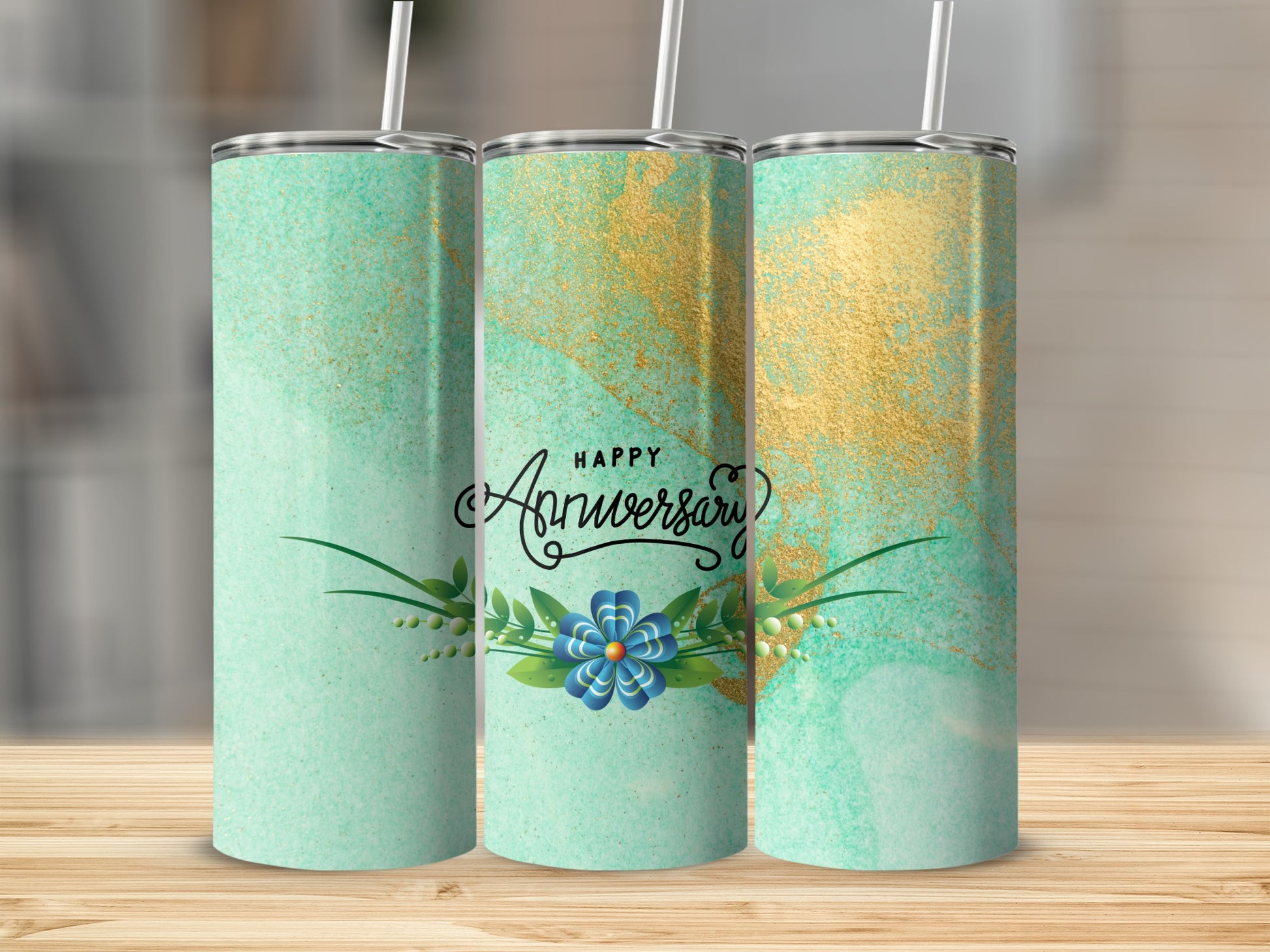 Green and gold abstract tumbler with "Happy Anniversary" text.