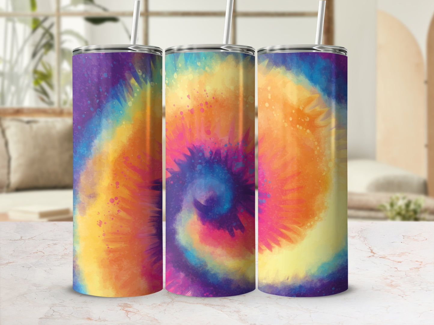 Three tumblers with colorful tie-dye patterns and straws side by side.