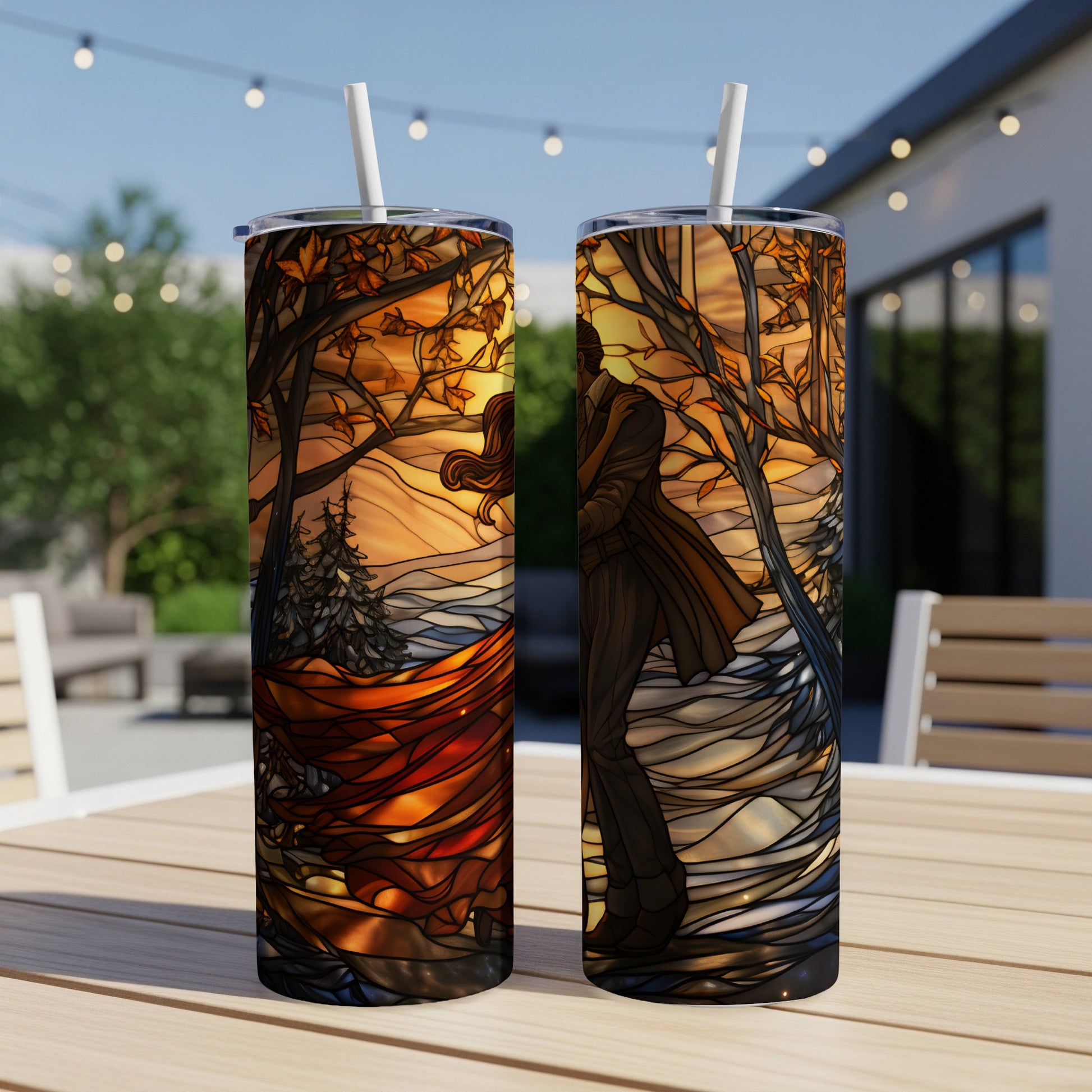 Couple embraced under stained glass trees at sunset on two tumblers.