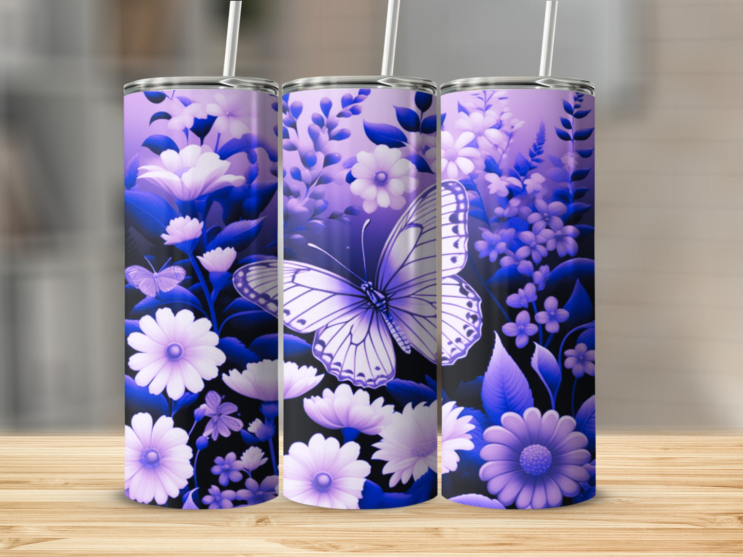 Purple and white floral butterfly design on three tumblers.