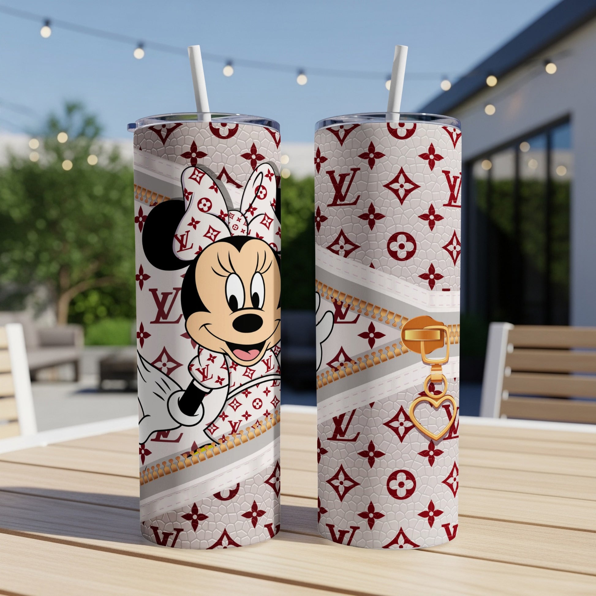 Minnie Mouse and LV pattern on insulated tumbler with straw and heart charm.