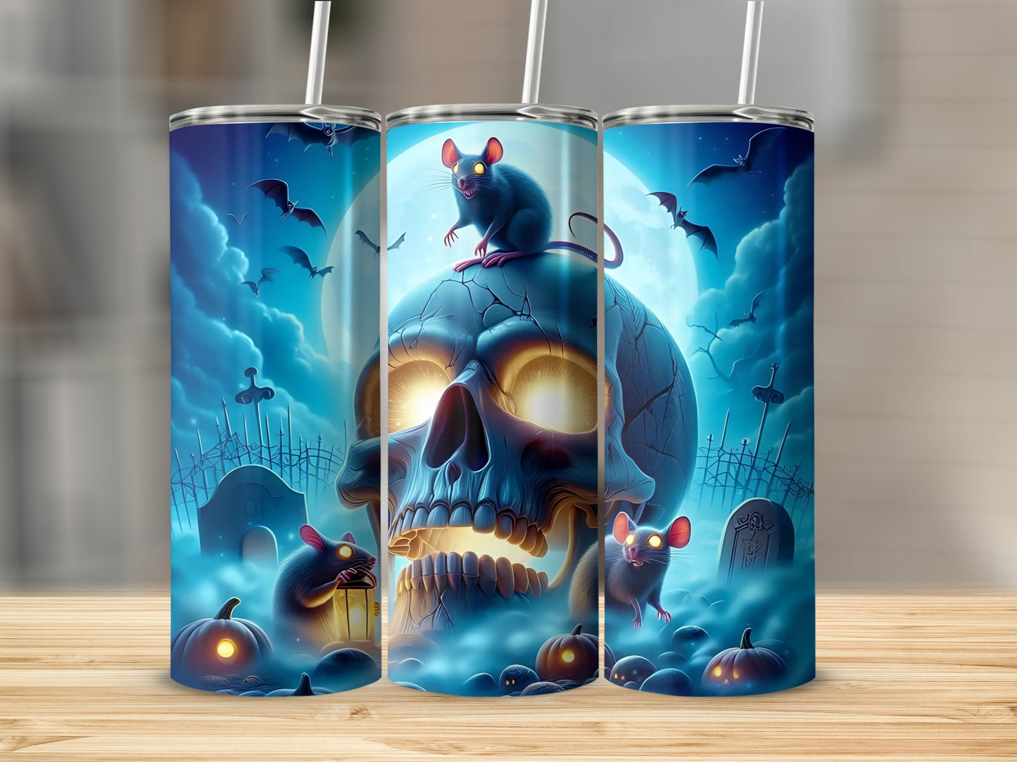 Halloween tumblers with glowing skull, mice, bats, and pumpkins in a spooky graveyard scene.