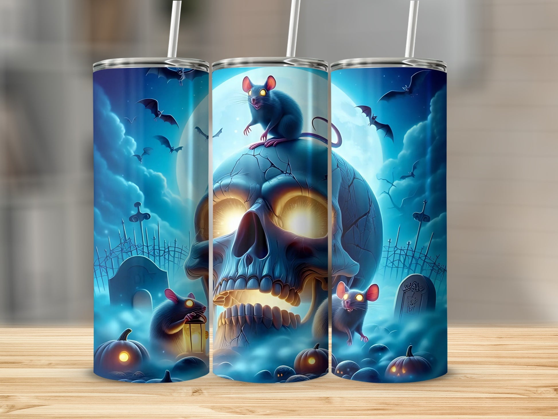 Halloween tumblers with glowing skull, mice, bats, and pumpkins in a spooky graveyard scene.