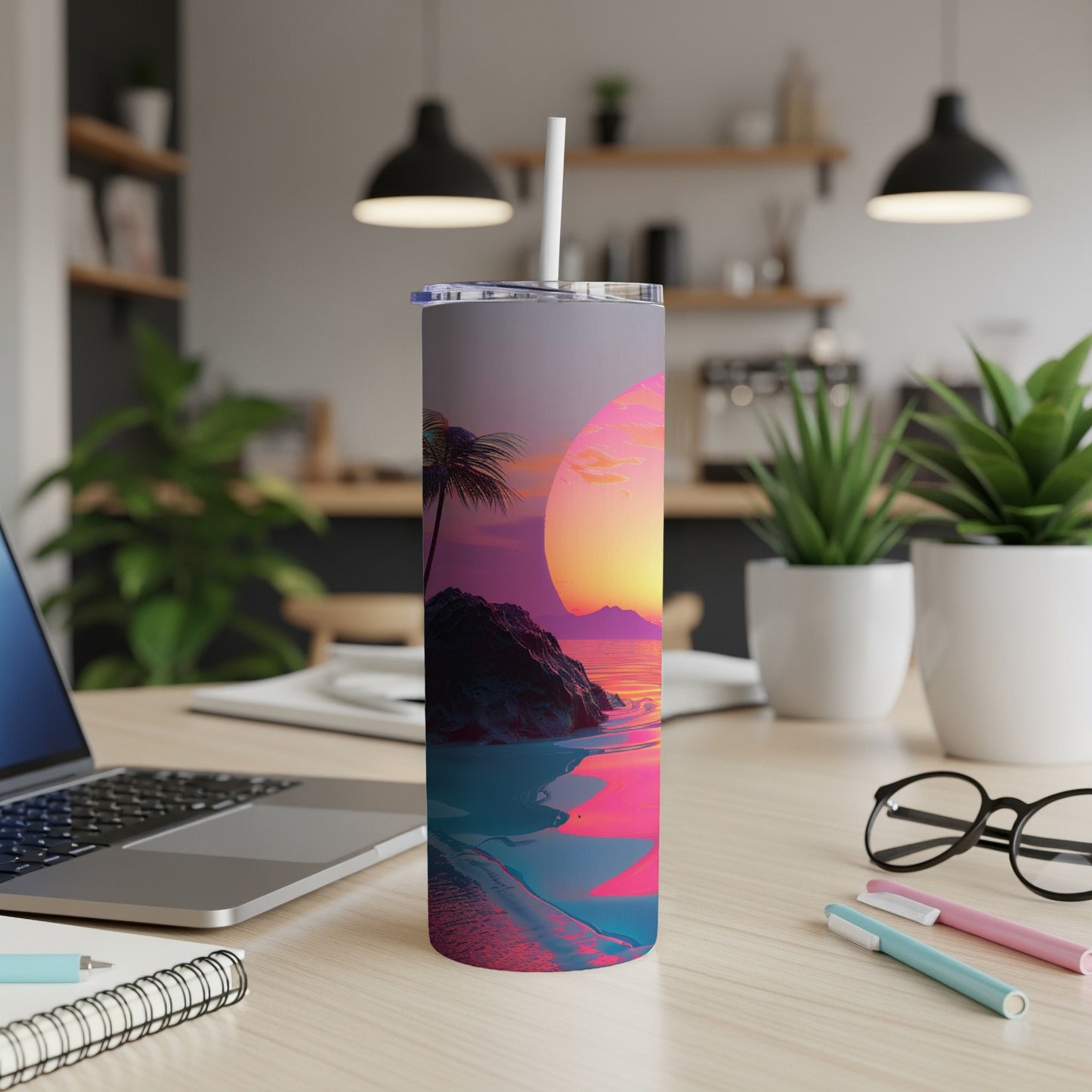 Tumbler with sunset beach scene and palm trees.