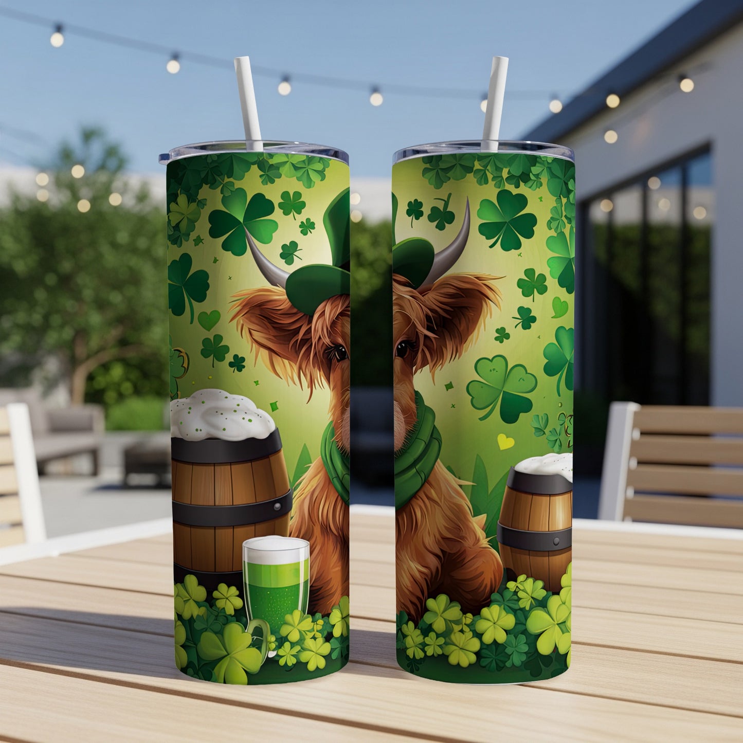 Highland cow in green hat with shamrocks, beer mug, and barrel on a tumbler.