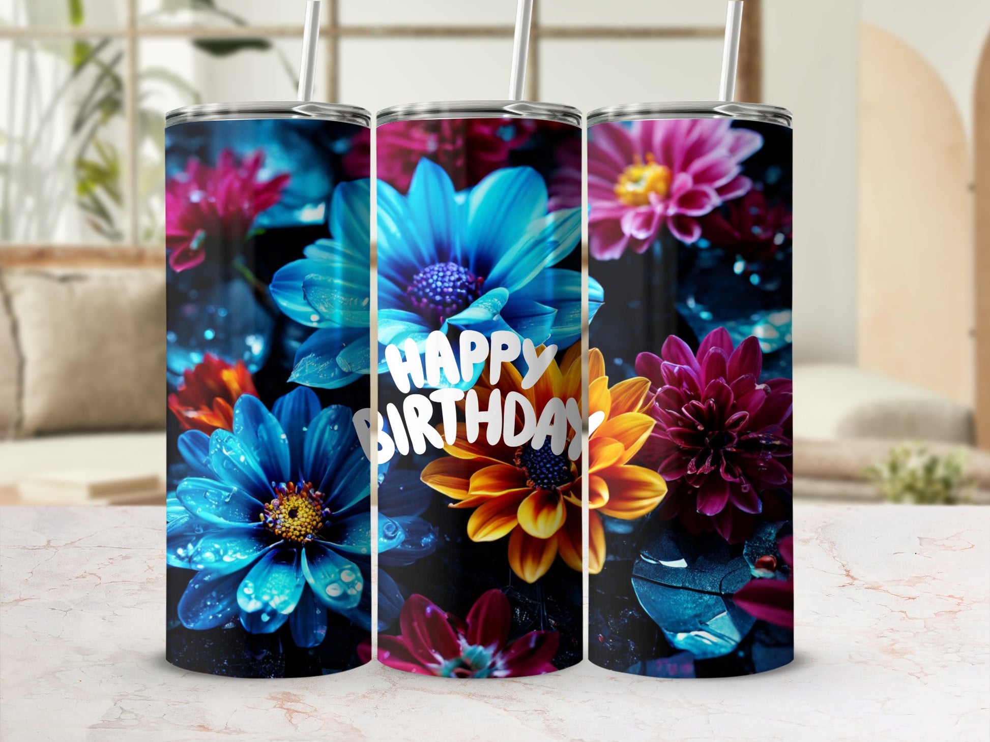 Three tumblers with blue, pink, and yellow flowers and "Happy Birthday" text.